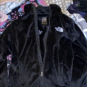 black fuzzy north face jacket